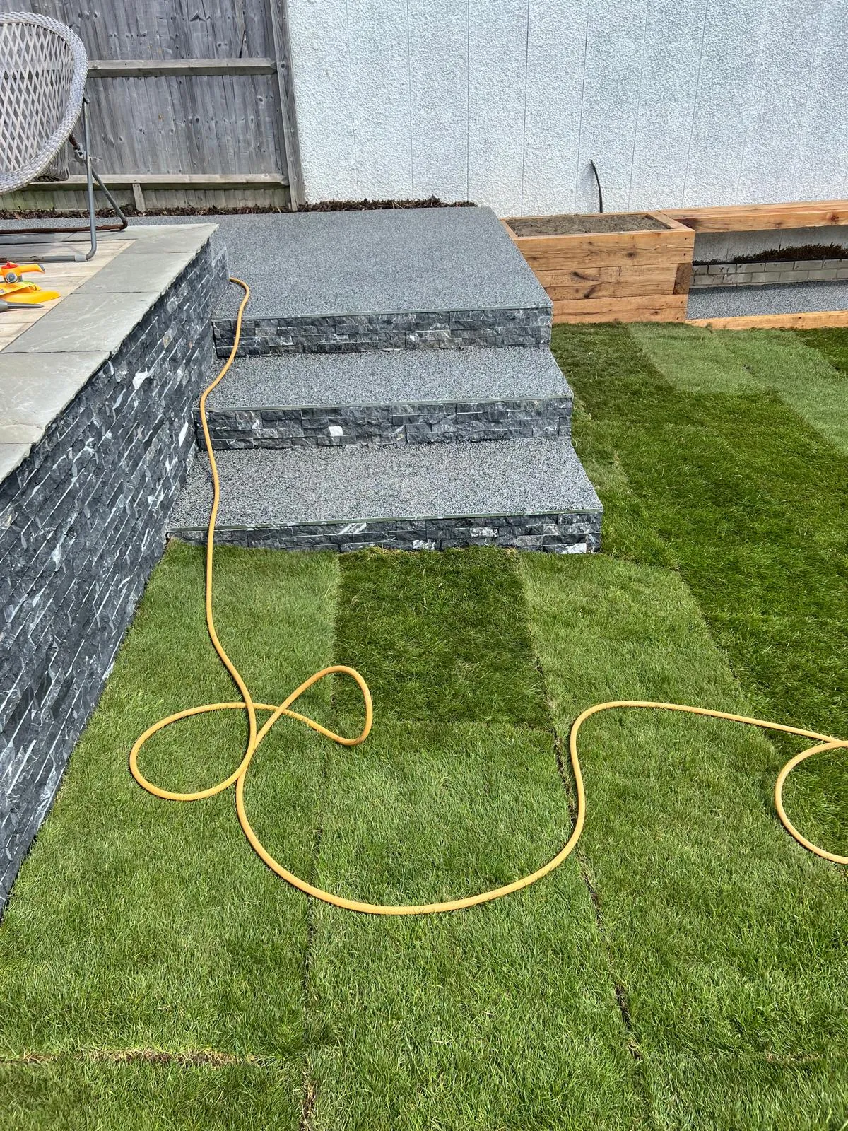 Family garden: The finished steps with new turf either side.