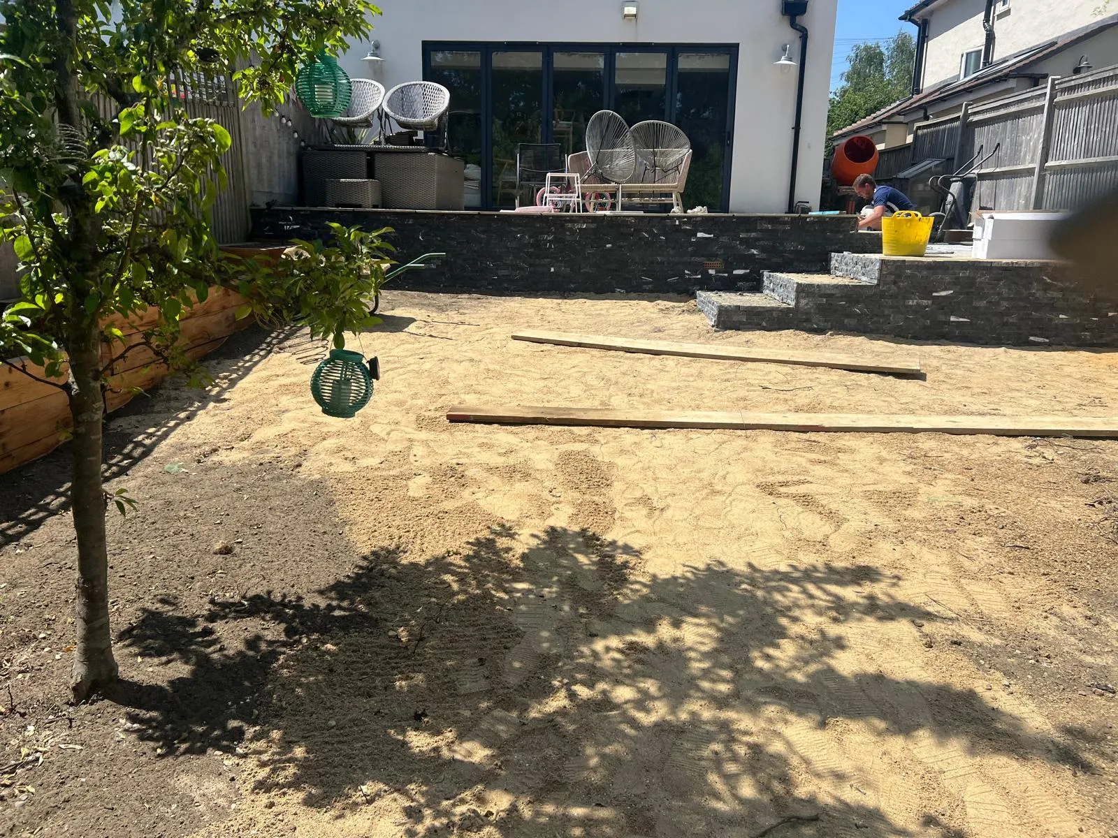 Sand base laid ready for paving.